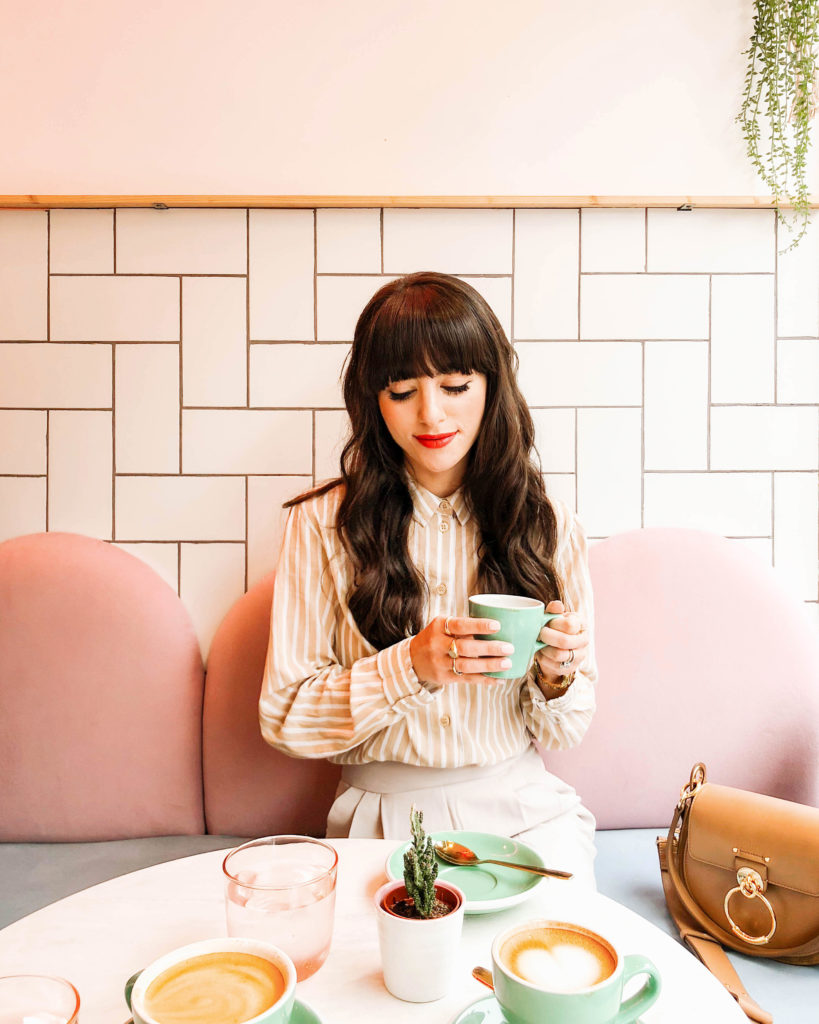 New Darlings Girl with Bangs and Coffee