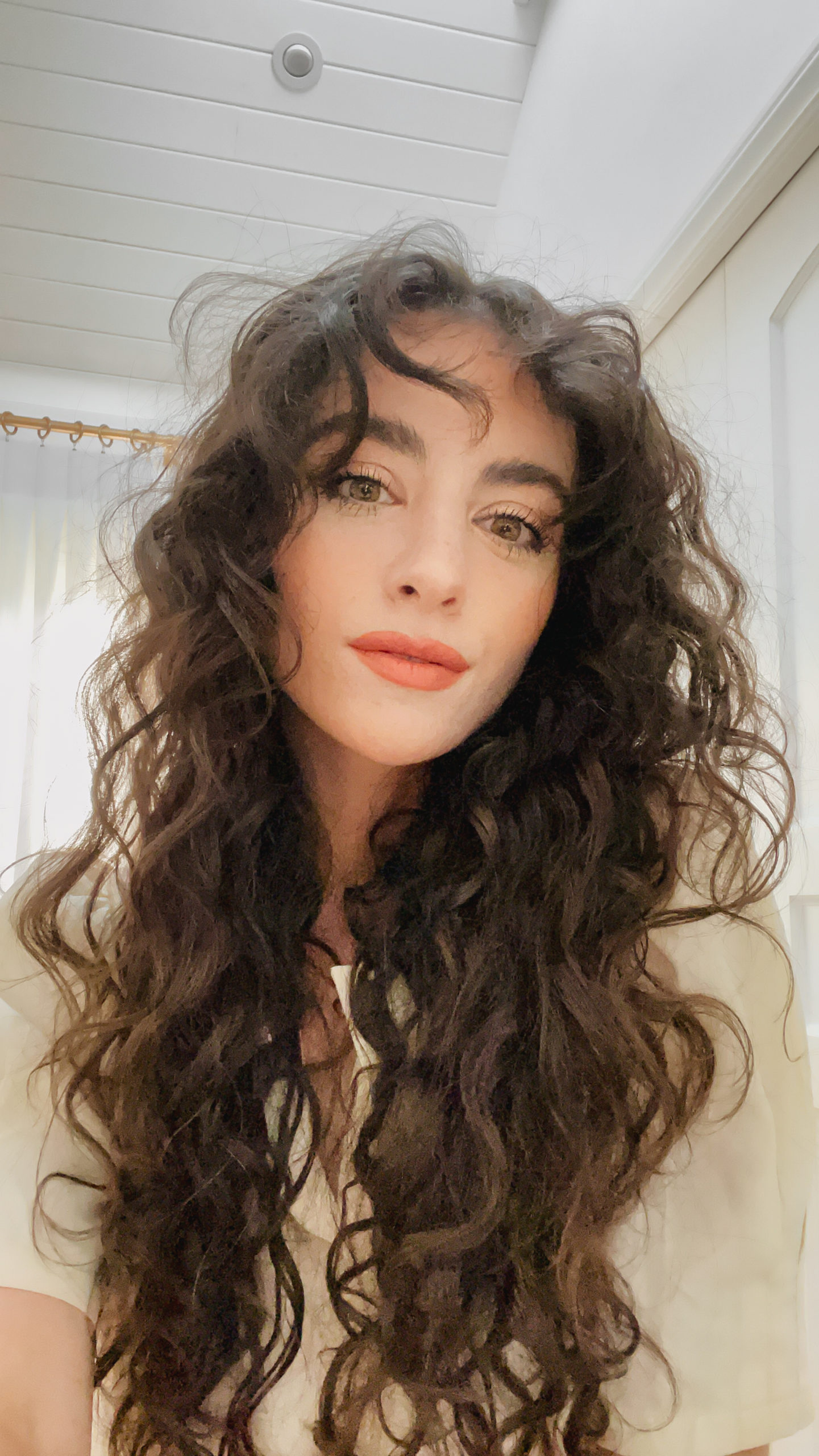 straight across bangs with curly hair